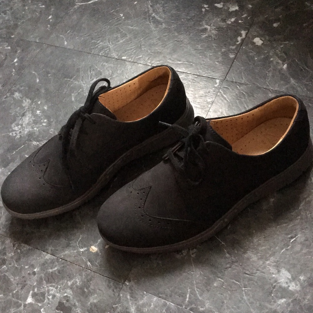 Size 7 woman’s Clark loafers. Black suede
